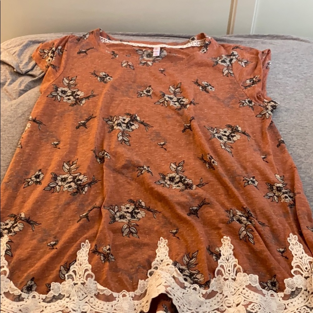 Pink blouse with flower pattern